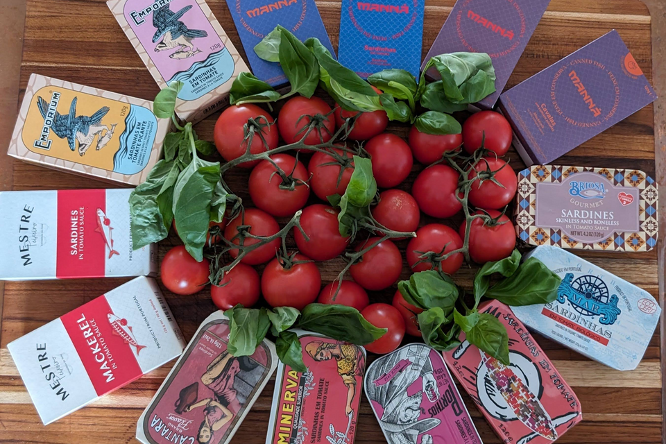 Various products in a circle around tomatoes